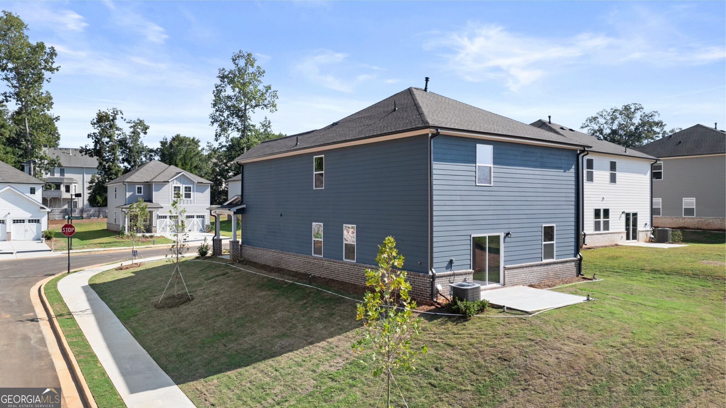 2464 Lennox Road Southeast Conyers, GA 30094 - Photo 4 of 27 a view of a house with backyard and sitting area