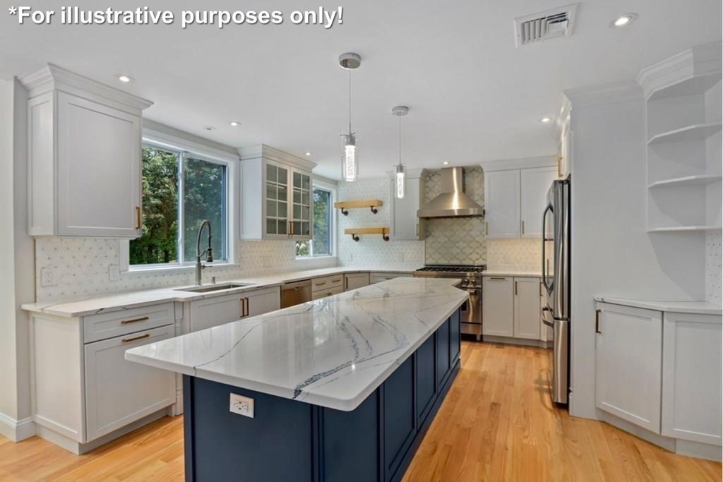 11 Bond Hollow Road Sutton, MA 01590 - Photo 2 of 20 a large kitchen with kitchen island a large counter top space stainless steel appliances and a window