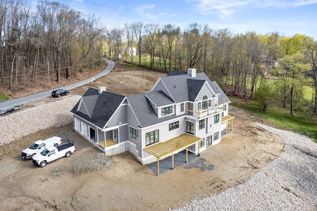 11 Bond Hollow Road Sutton, MA 01590 - Photo 6 of 20 a house with trees in front of it