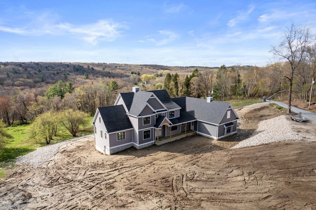11 Bond Hollow Road Sutton, MA 01590 - Photo 7 of 20 an aerial view of a sitting area with furniture