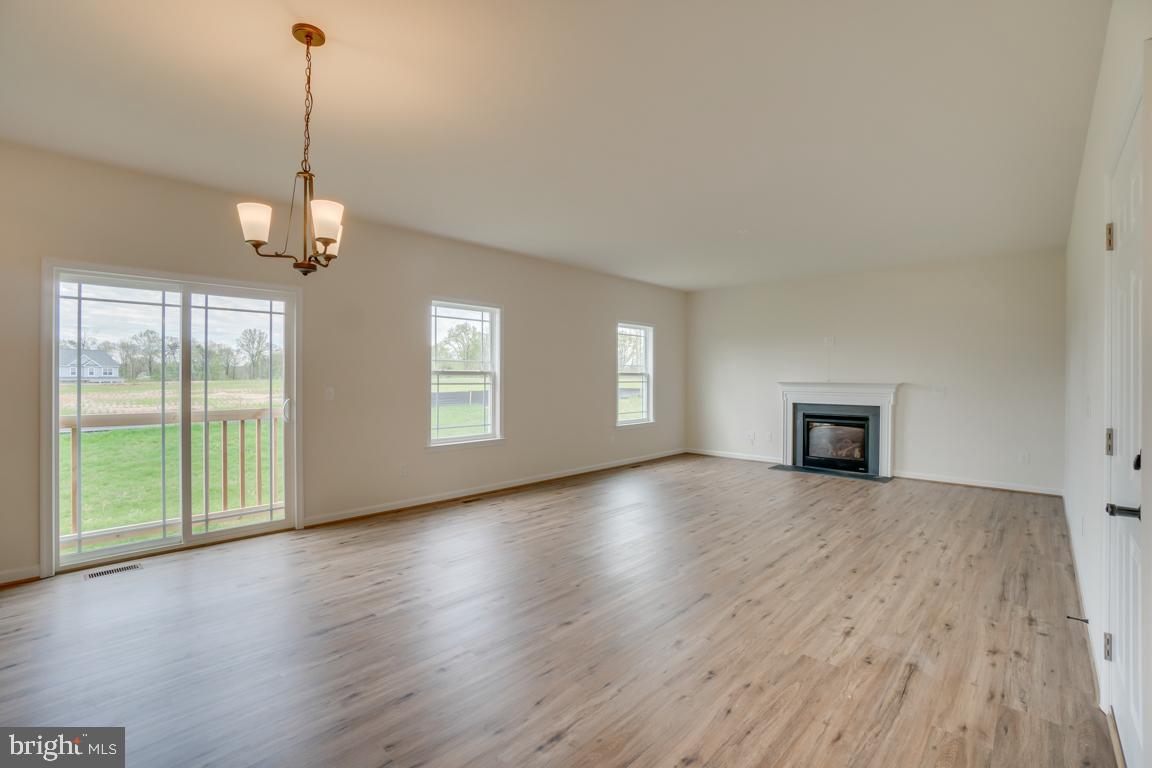 0 Latane Drive Colonial Beach, VA 22443 - Photo 23 of 38 Family Room Opens to Kitchen, Deck + Backyard