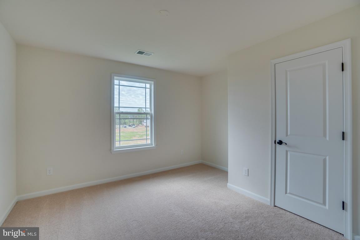 0 Latane Drive Colonial Beach, VA 22443 - Photo 30 of 38 Sunlit Secondary Bedroom w/ Walk in closet