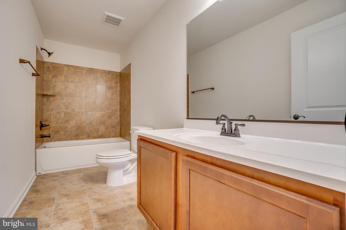 0 Latane Drive Colonial Beach, VA 22443 - Photo 35 of 38 Upper lvl full bath w/ tiled tub-shower combo