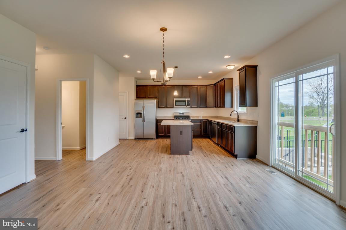 0 Latane Drive Colonial Beach, VA 22443 - Photo 5 of 38 Open Dining Flows to Kitchen + Deck Area