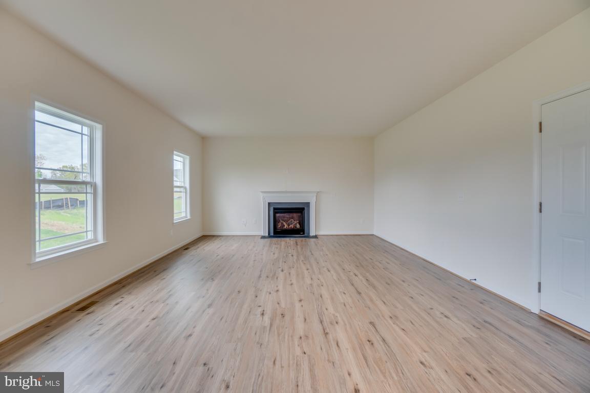 0 Latane Drive Colonial Beach, VA 22443 - Photo 7 of 38 Inviting Family Room w/ Fireplace + LVP floors