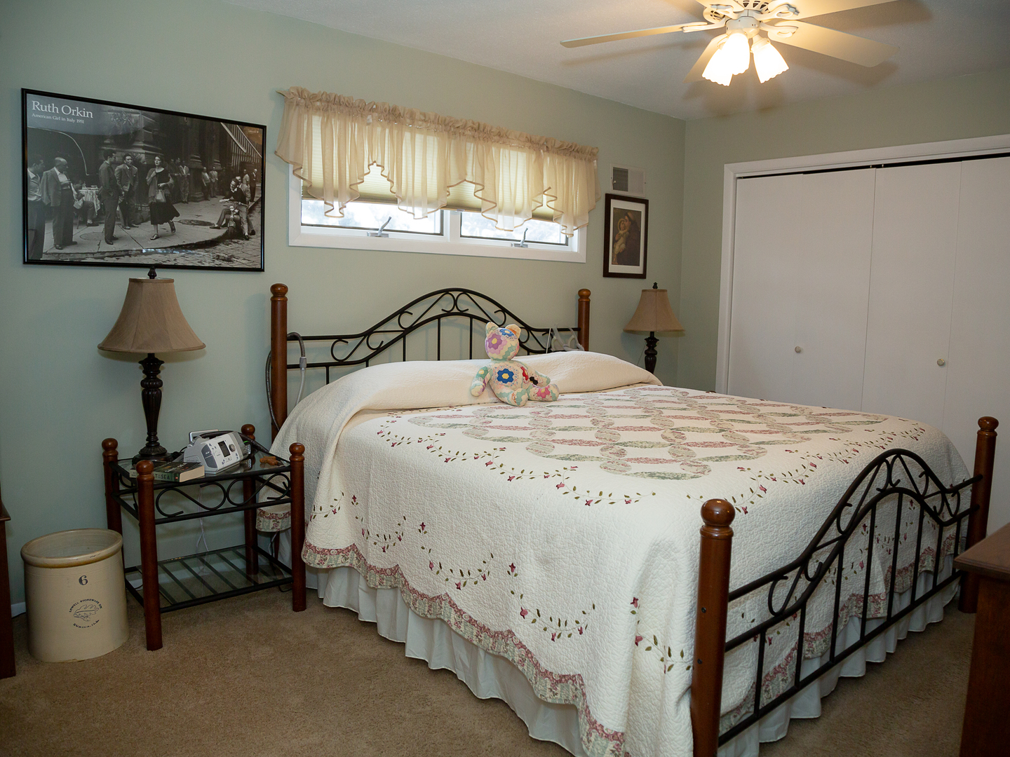 209 Kay Street Tonica, IL 61370 - Photo 13 of 40 a bedroom with a bed and a chandelier
