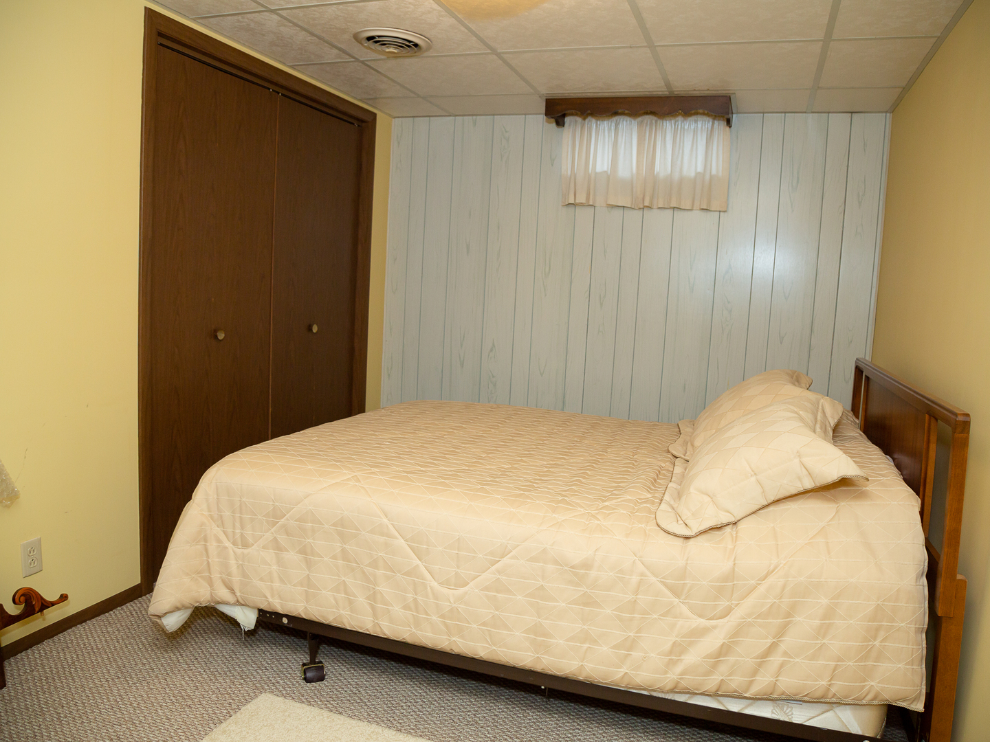 209 Kay Street Tonica, IL 61370 - Photo 25 of 40 a bedroom with a bed and a mirror