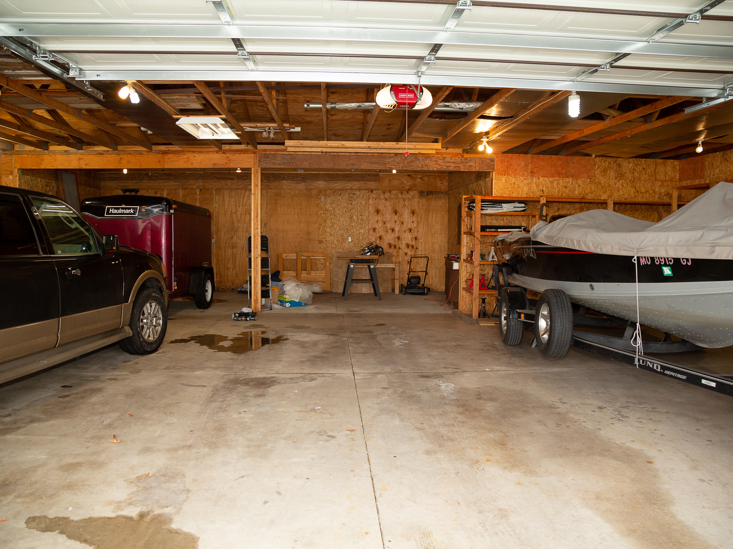 209 Kay Street Tonica, IL 61370 - Photo 34 of 40 a view of parking garage with cars