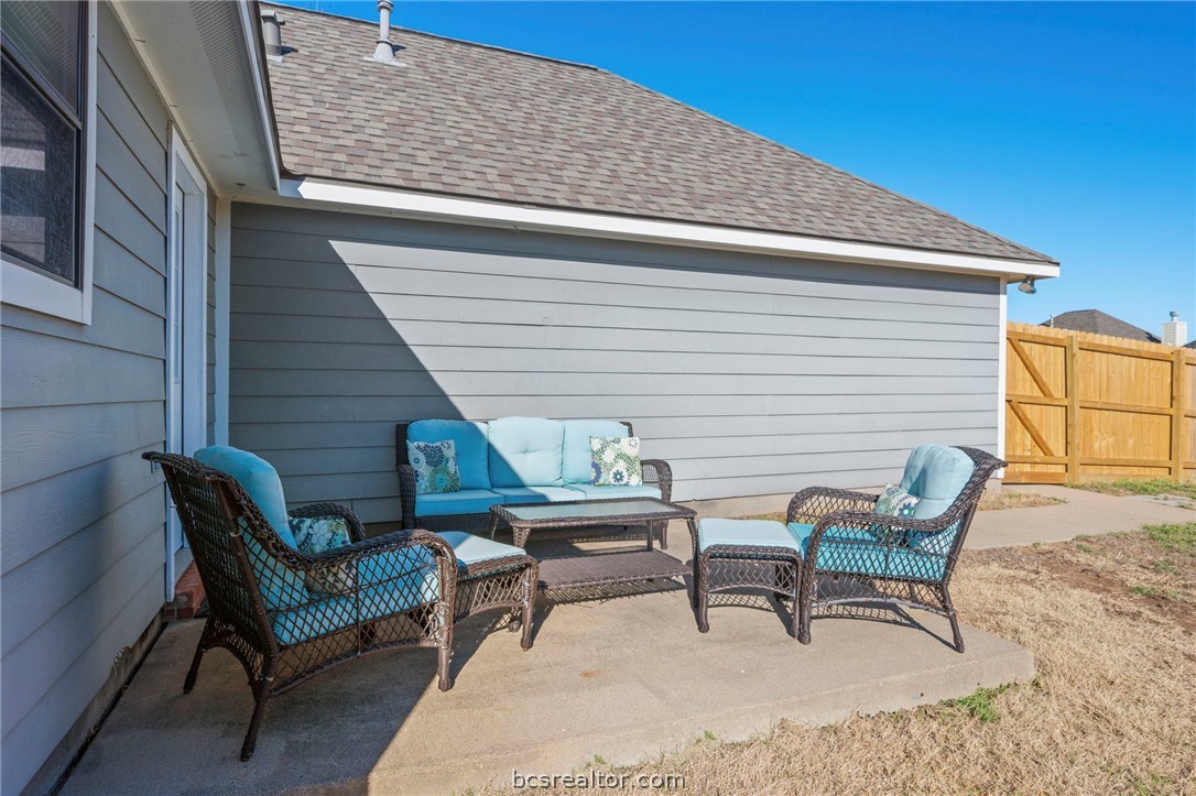 2000 Turning Leaf Drive Bryan, TX 77807 - Photo 15 of 20 a roof deck with a table and chairs