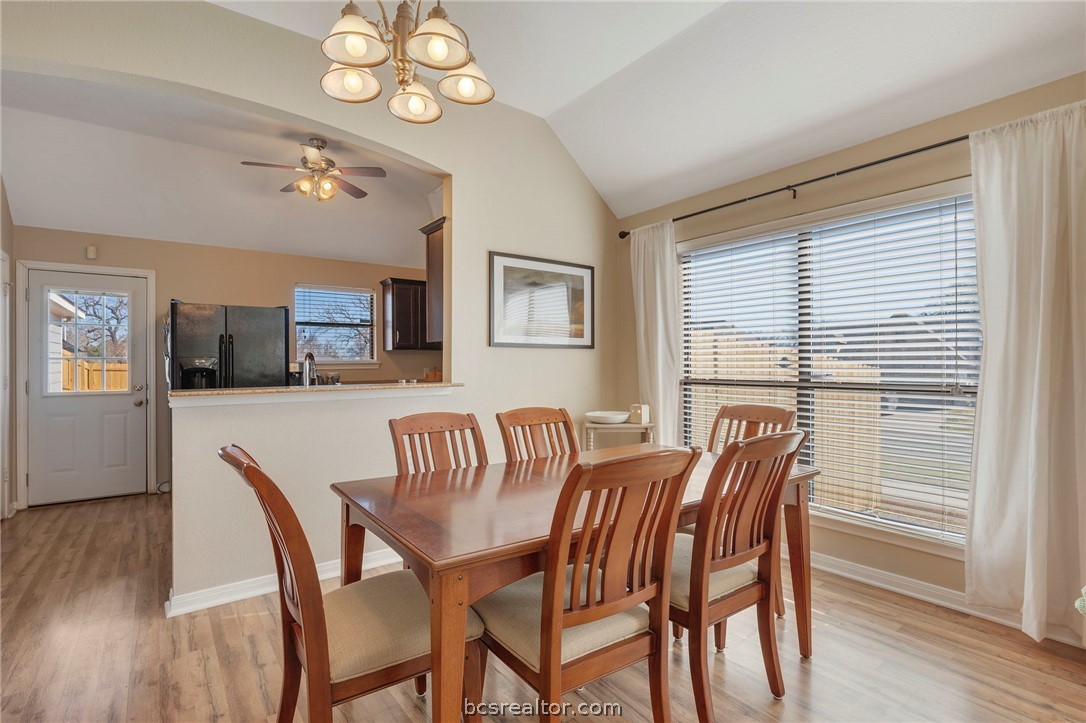 2000 Turning Leaf Drive Bryan, TX 77807 - Photo 4 of 20 a view of a dining room with furniture and wooden floor