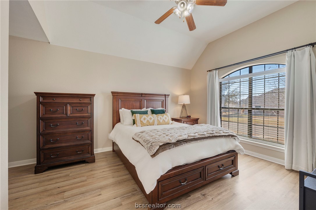 2000 Turning Leaf Drive Bryan, TX 77807 - Photo 8 of 20 a bed room with a bed and a window