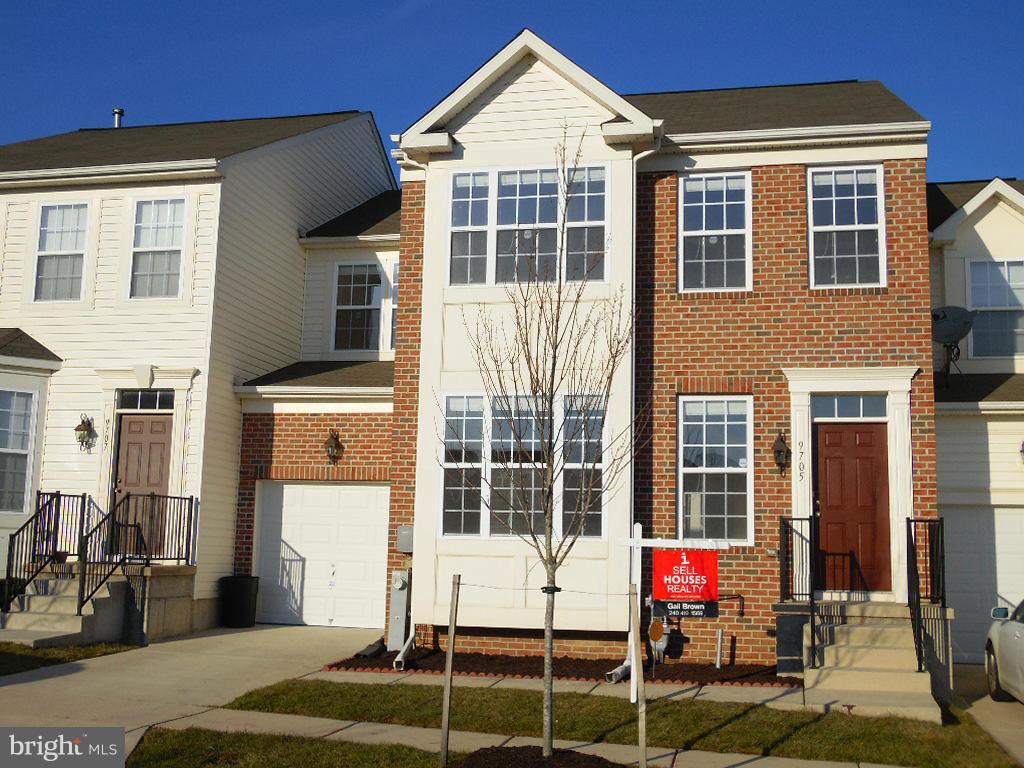 9705 Langley Road Baltimore, MD 21220 - Photo 1 of 26 a front view of a house with a patio