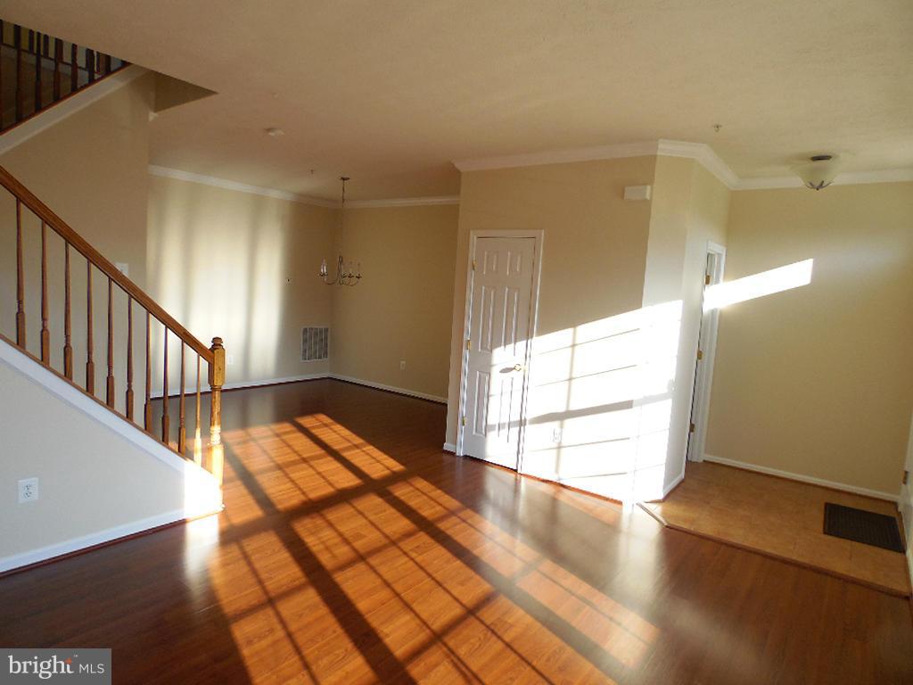 9705 Langley Road Baltimore, MD 21220 - Photo 2 of 26 a view of empty room with wooden floor
