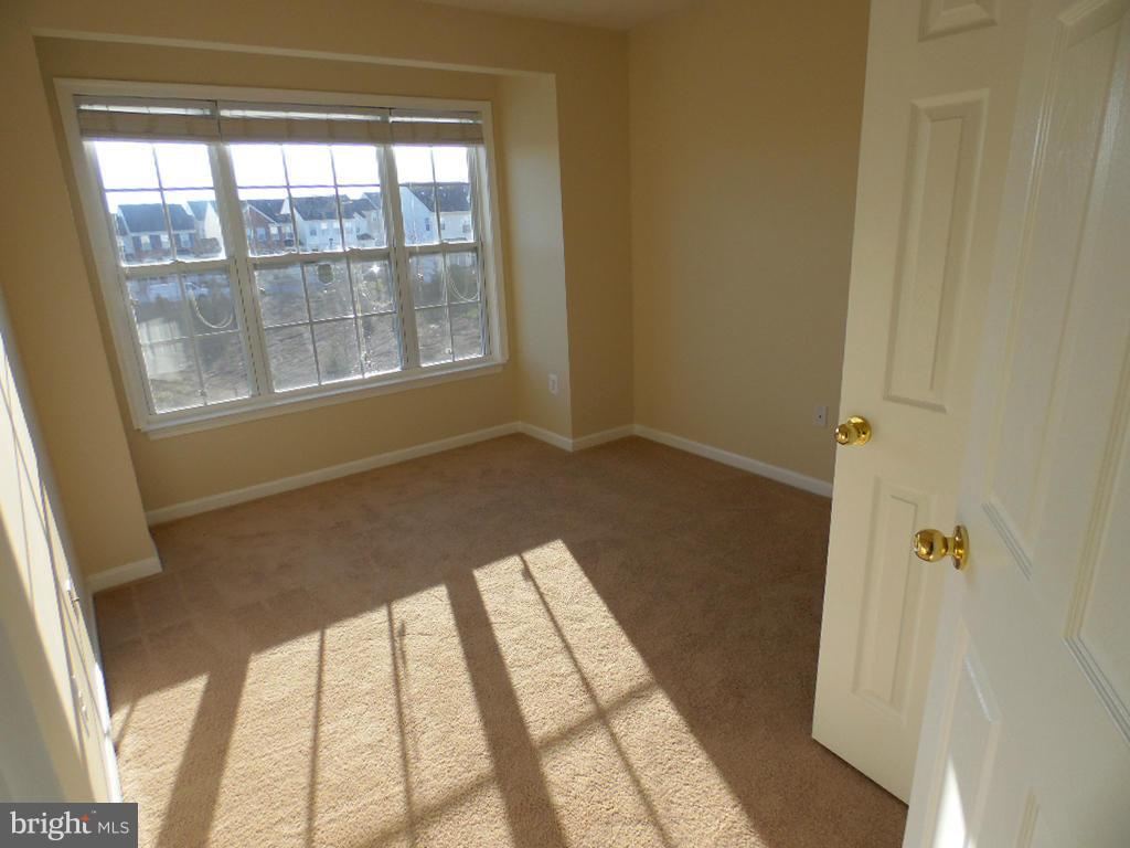 9705 Langley Road Baltimore, MD 21220 - Photo 8 of 26 a view of an empty room and window