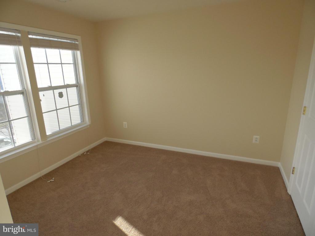 9705 Langley Road Baltimore, MD 21220 - Photo 10 of 26 an empty room with a window