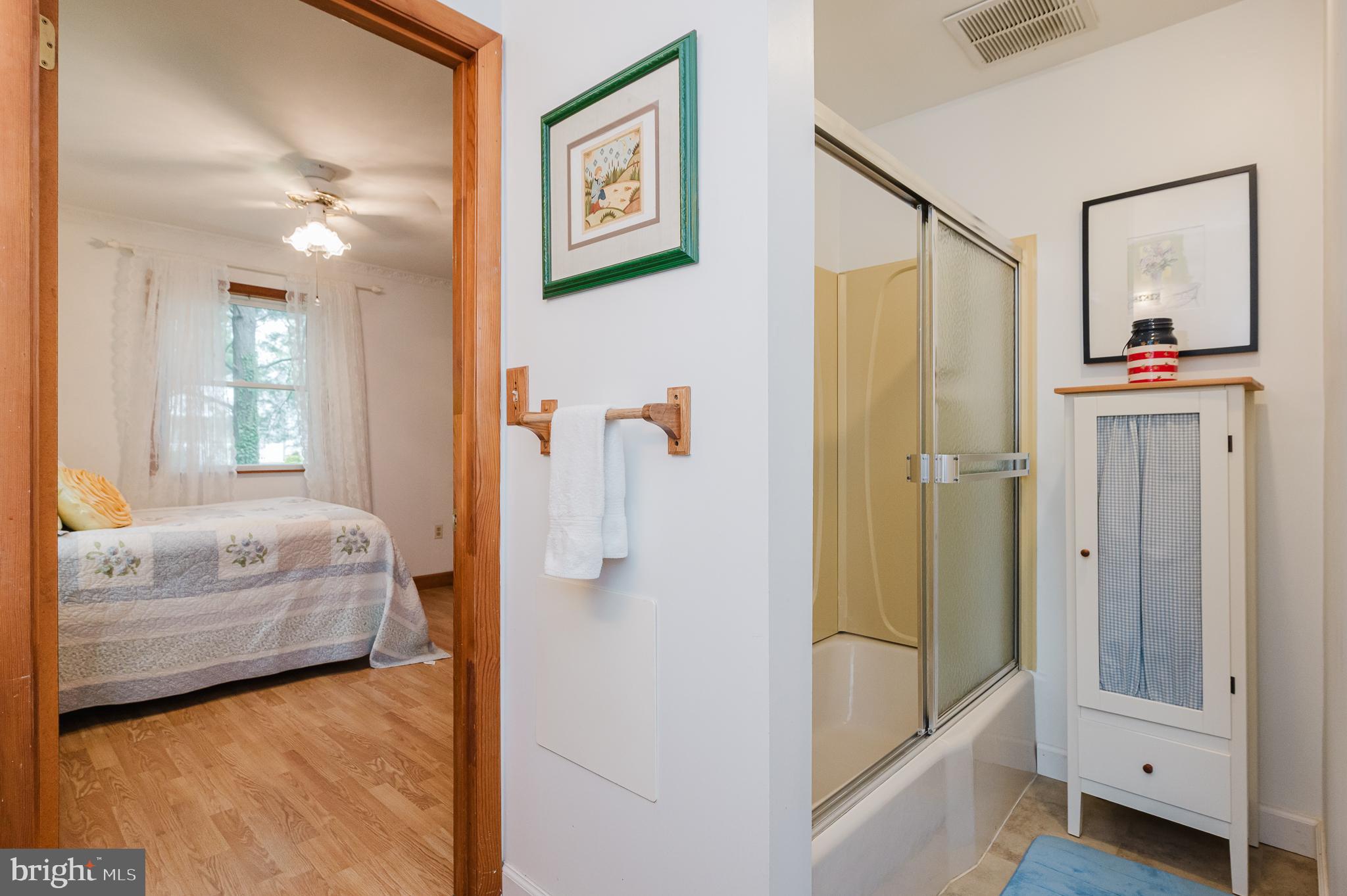710 Magnolia Road Joppa, MD 21085 - Photo 15 of 58 a en suite bathroom with a tub and shower