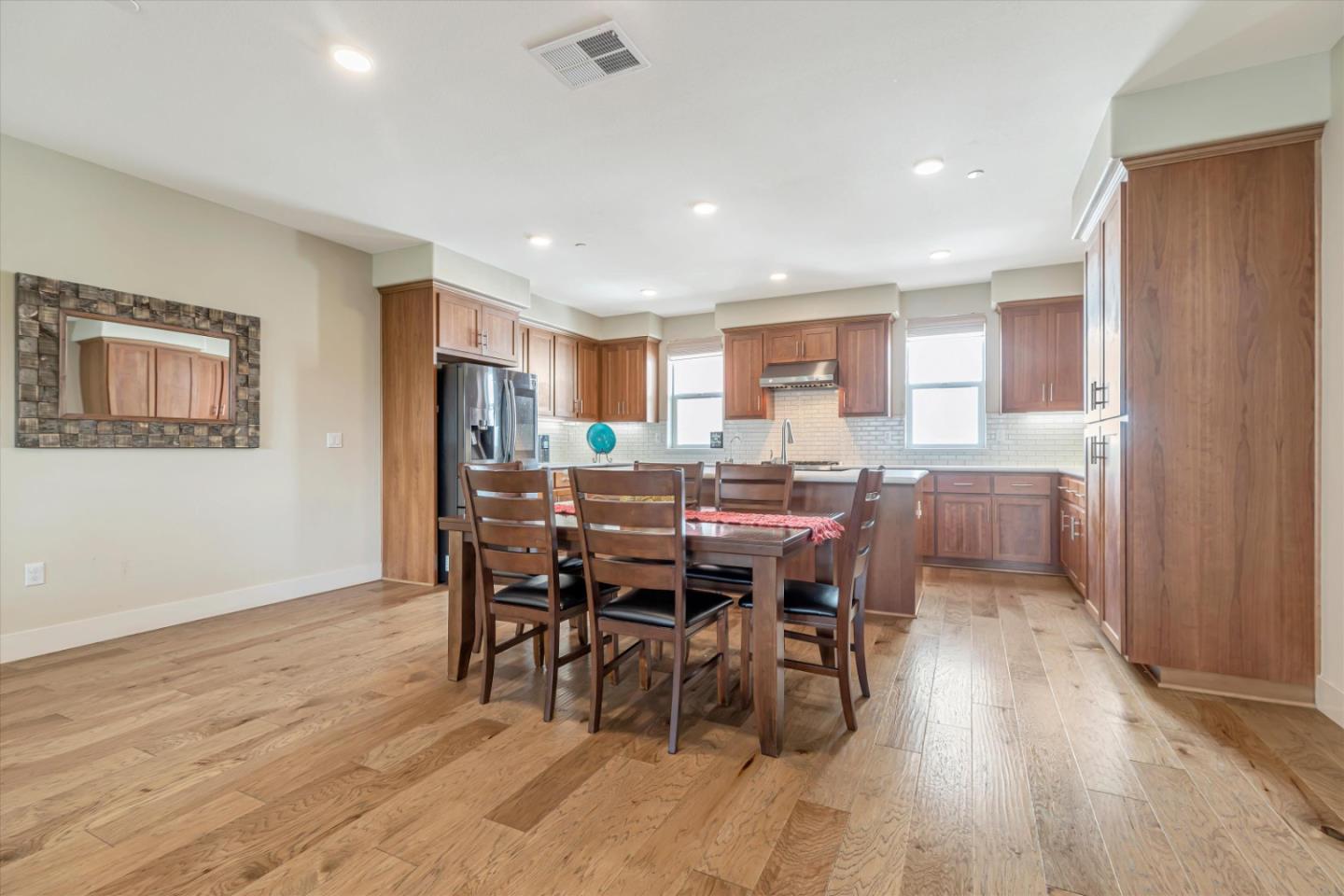 1480 Bond Street Milpitas, CA 95035 - Photo 18 of 51 a view of a dining room with furniture and wooden floor