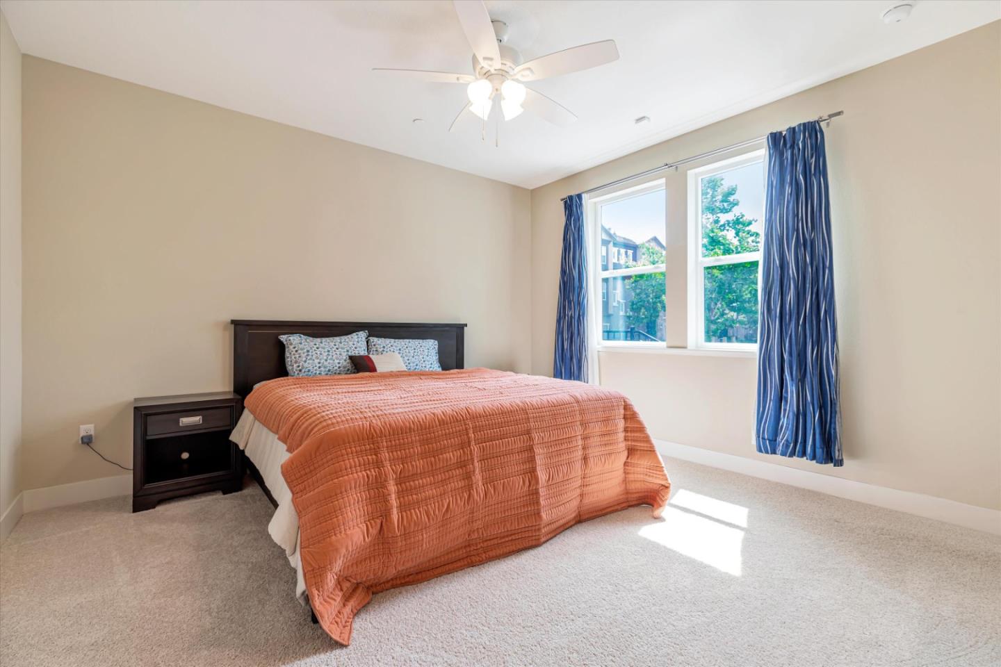 1480 Bond Street Milpitas, CA 95035 - Photo 19 of 51 a bedroom with a bed and window