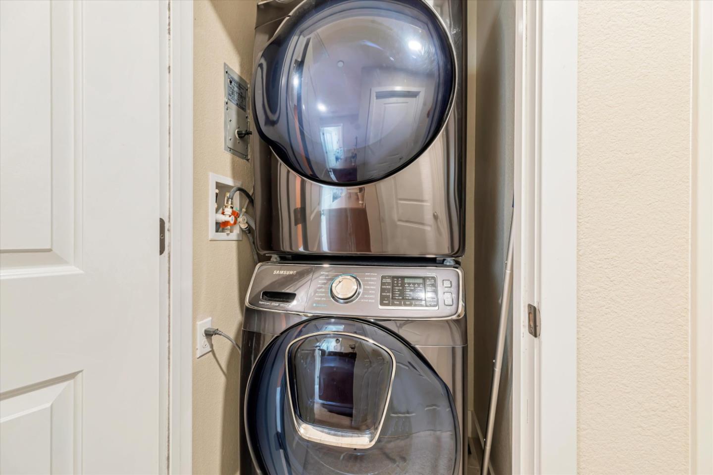 1480 Bond Street Milpitas, CA 95035 - Photo 33 of 51 a bathroom with a mirror and a sink