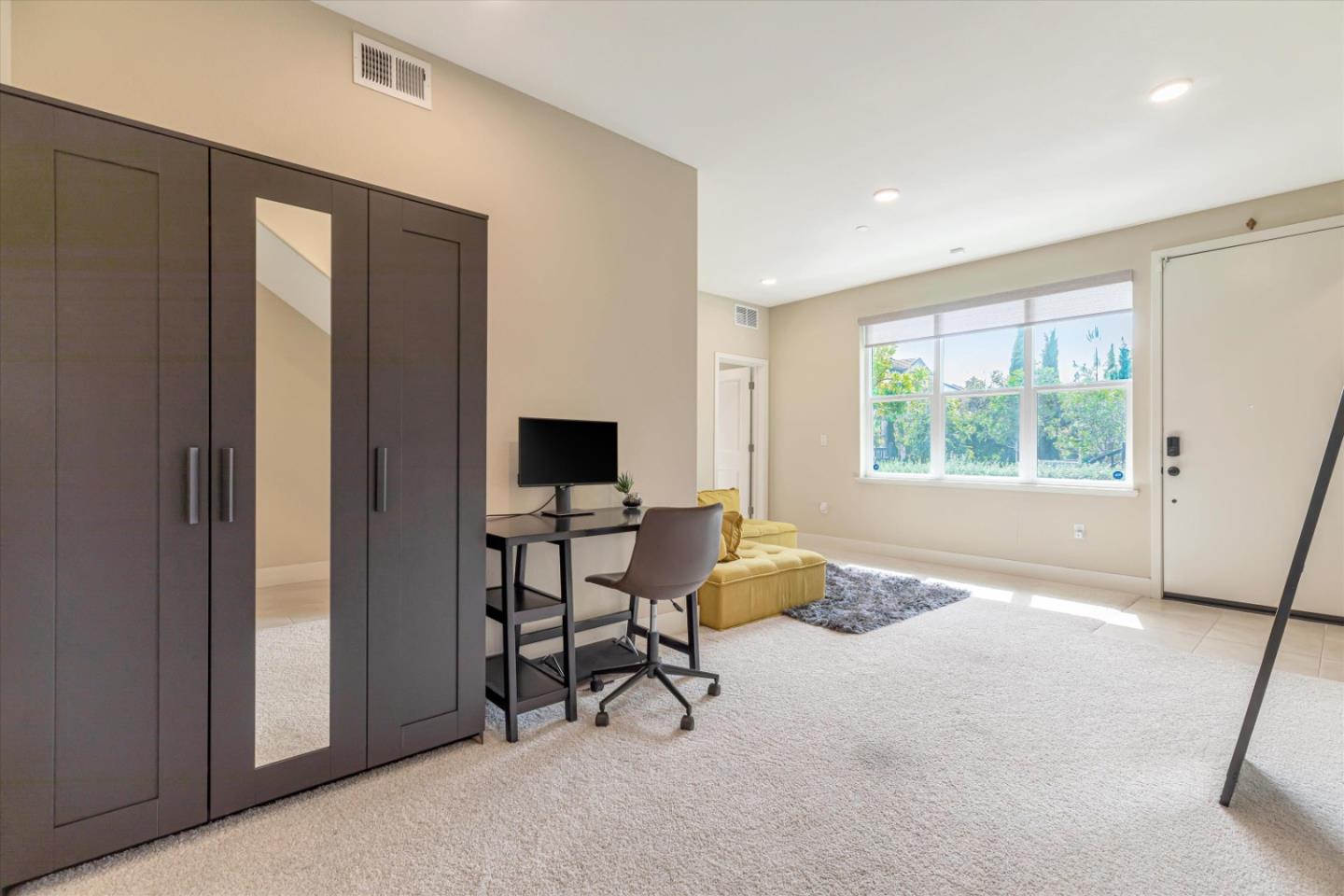 1480 Bond Street Milpitas, CA 95035 - Photo 5 of 51 a living room with furniture and a window