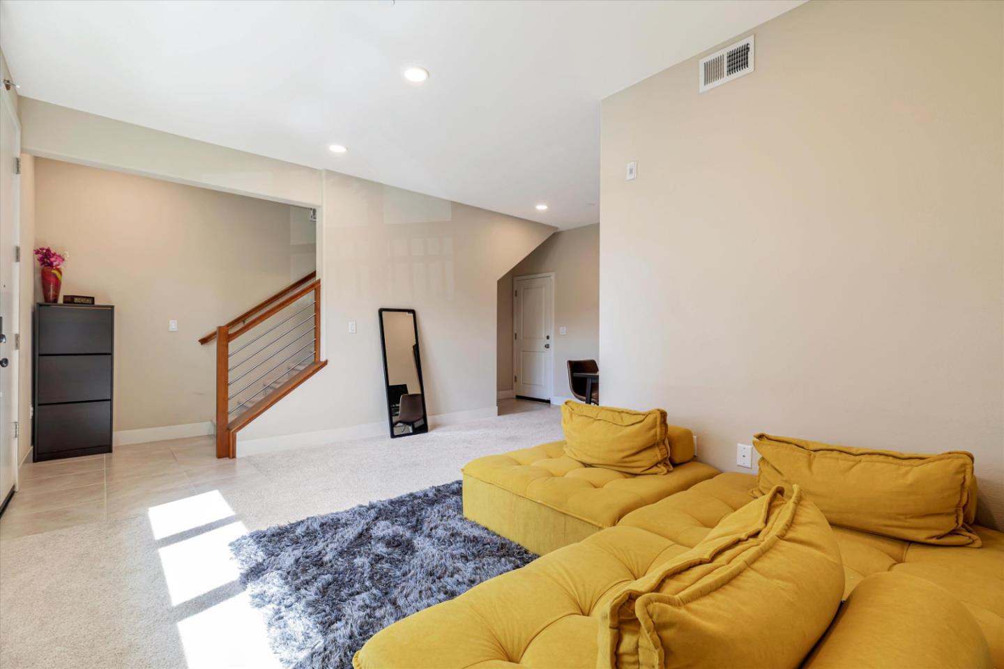 1480 Bond Street Milpitas, CA 95035 - Photo 6 of 51 a living room with a couch