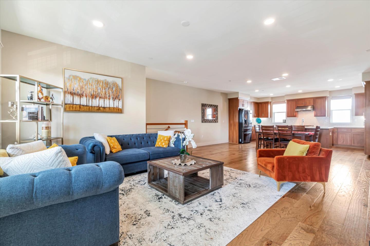 1480 Bond Street Milpitas, CA 95035 - Photo 9 of 51 a living room with furniture kitchen view and a large mirror