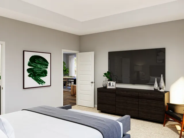 a bedroom with a bed and a mirror