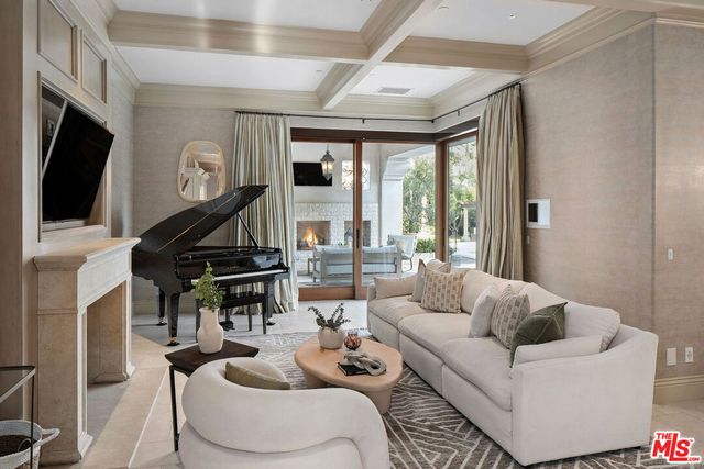 a utility room with cabinets washer and dryer