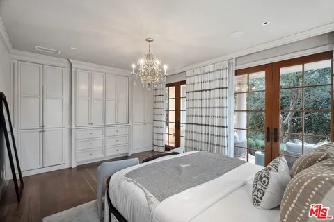 a view of a house with garden and porch