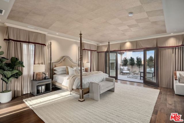 a bathroom with a shower sink and mirror