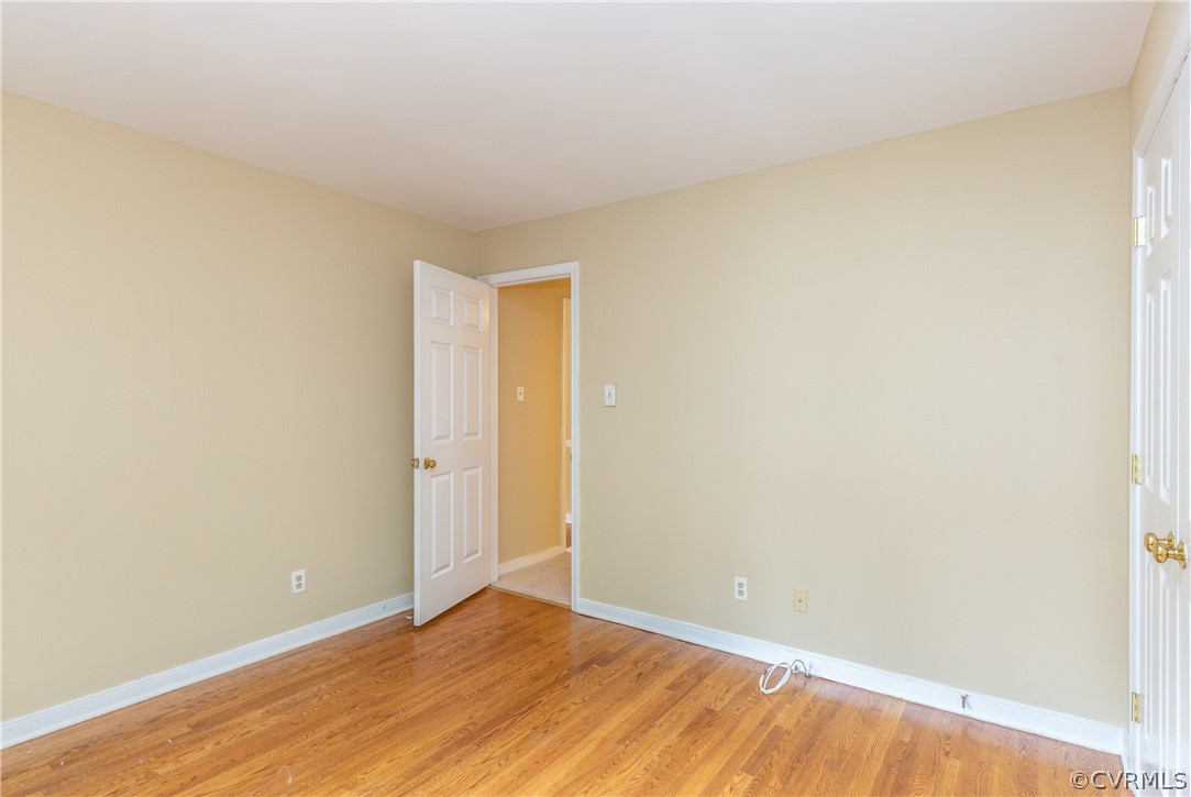 3561 Markey Road Midlothian, VA 23112 - Photo 13 of 48 a view of an empty room with wooden floor