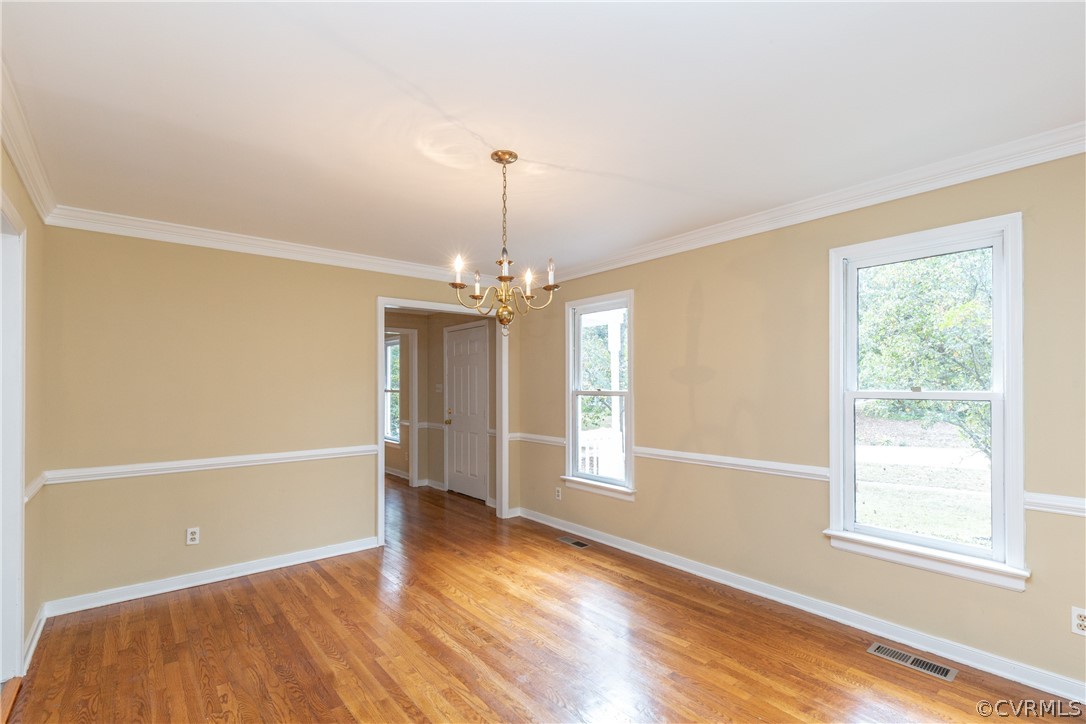 3561 Markey Road Midlothian, VA 23112 - Photo 16 of 48 a view of an empty room with wooden floor and a window
