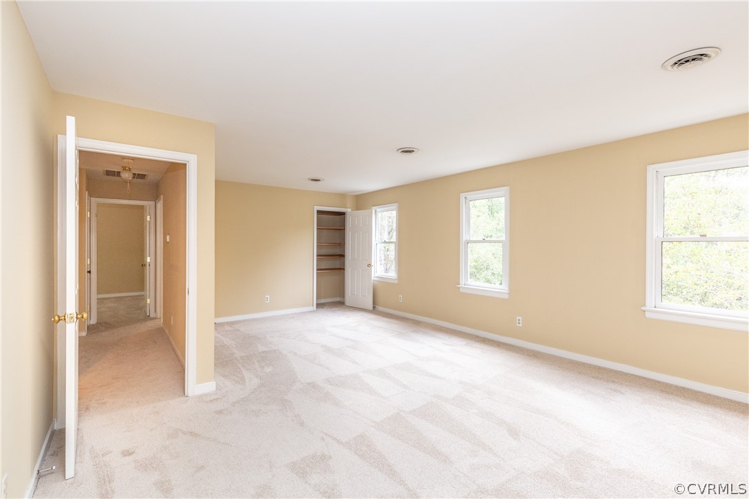 3561 Markey Road Midlothian, VA 23112 - Photo 32 of 48 an empty room with windows and closet