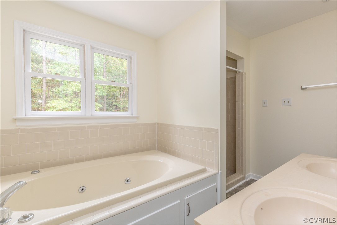 3561 Markey Road Midlothian, VA 23112 - Photo 34 of 48 a bathroom with a tub and a window
