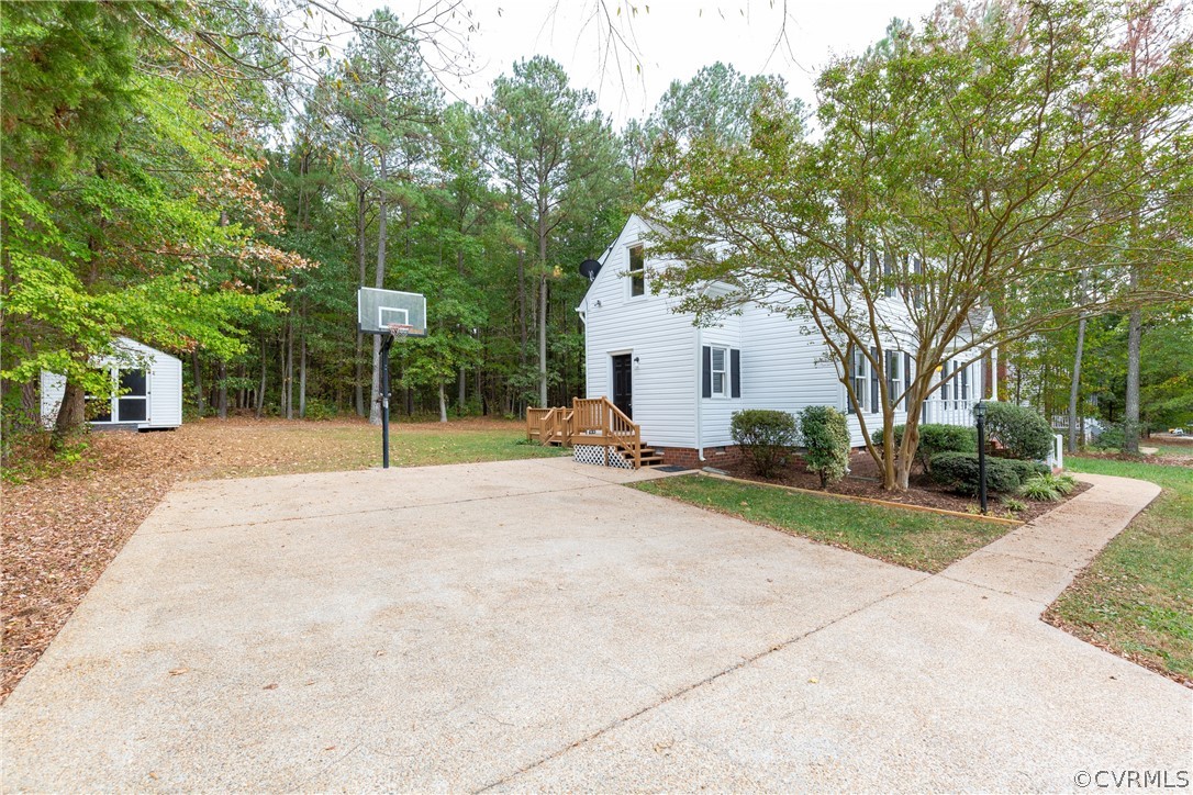 3561 Markey Road Midlothian, VA 23112 - Photo 43 of 48 a house with trees in front of it