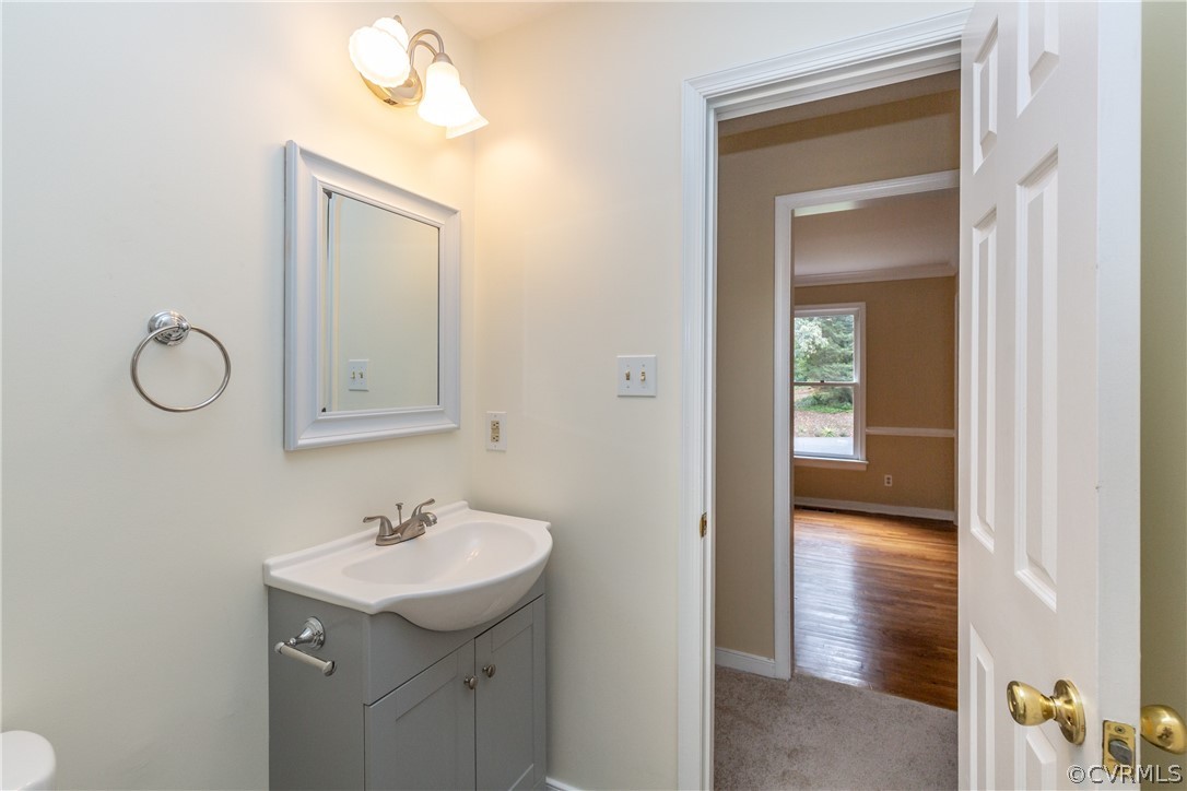 3561 Markey Road Midlothian, VA 23112 - Photo 10 of 48 a bathroom with a sink and a mirror