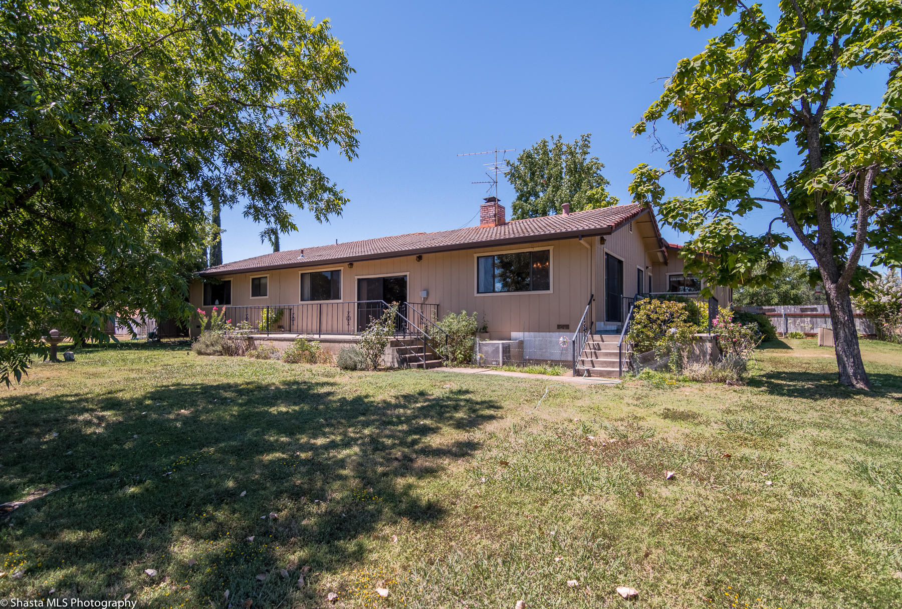 9229 Stillwater Road Redding, CA 96002 - Photo 21 of 27 Back side view of home