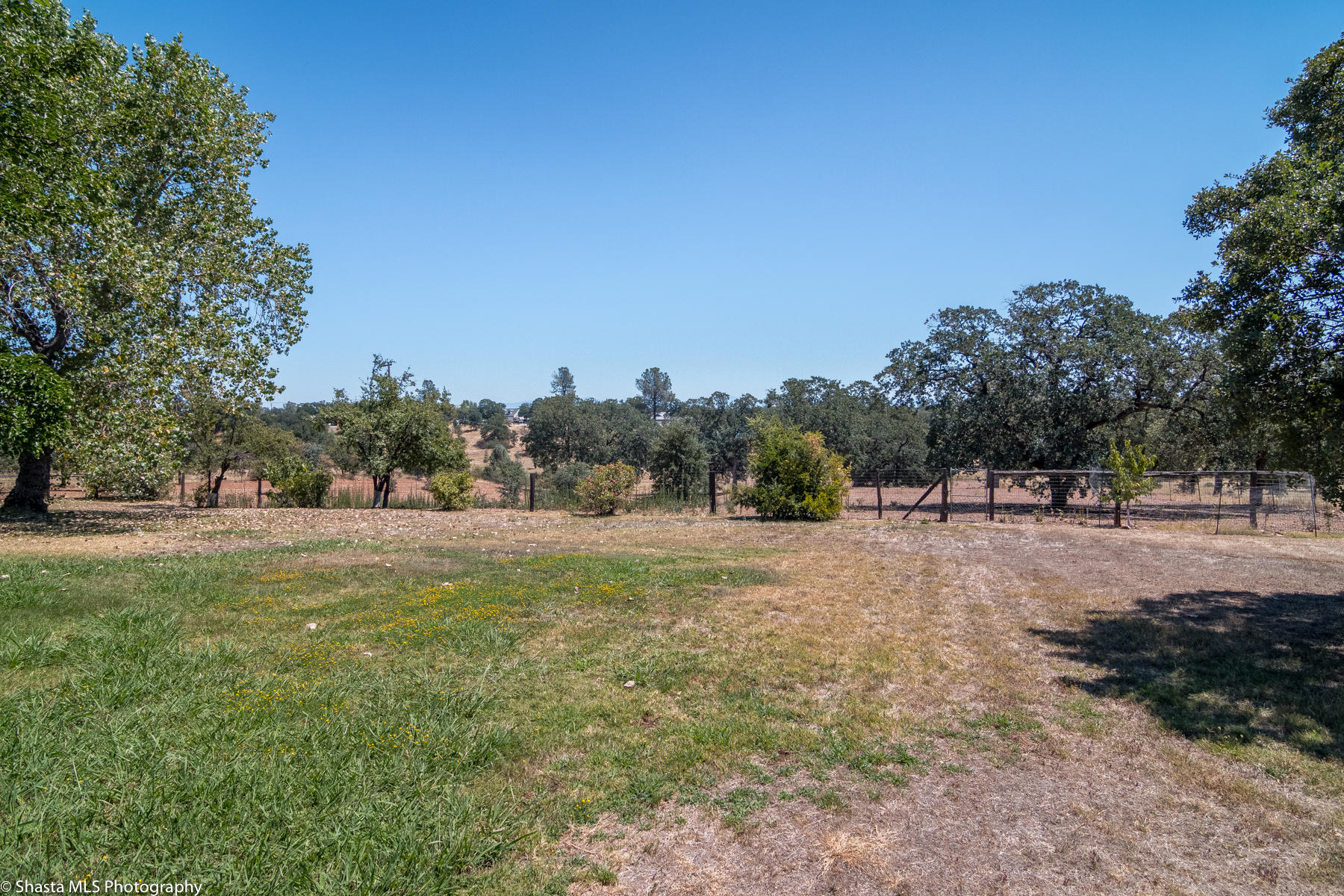 9229 Stillwater Road Redding, CA 96002 - Photo 24 of 27 Fenced Backyard