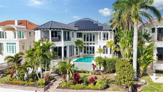 a balcony with furniture and a fireplace