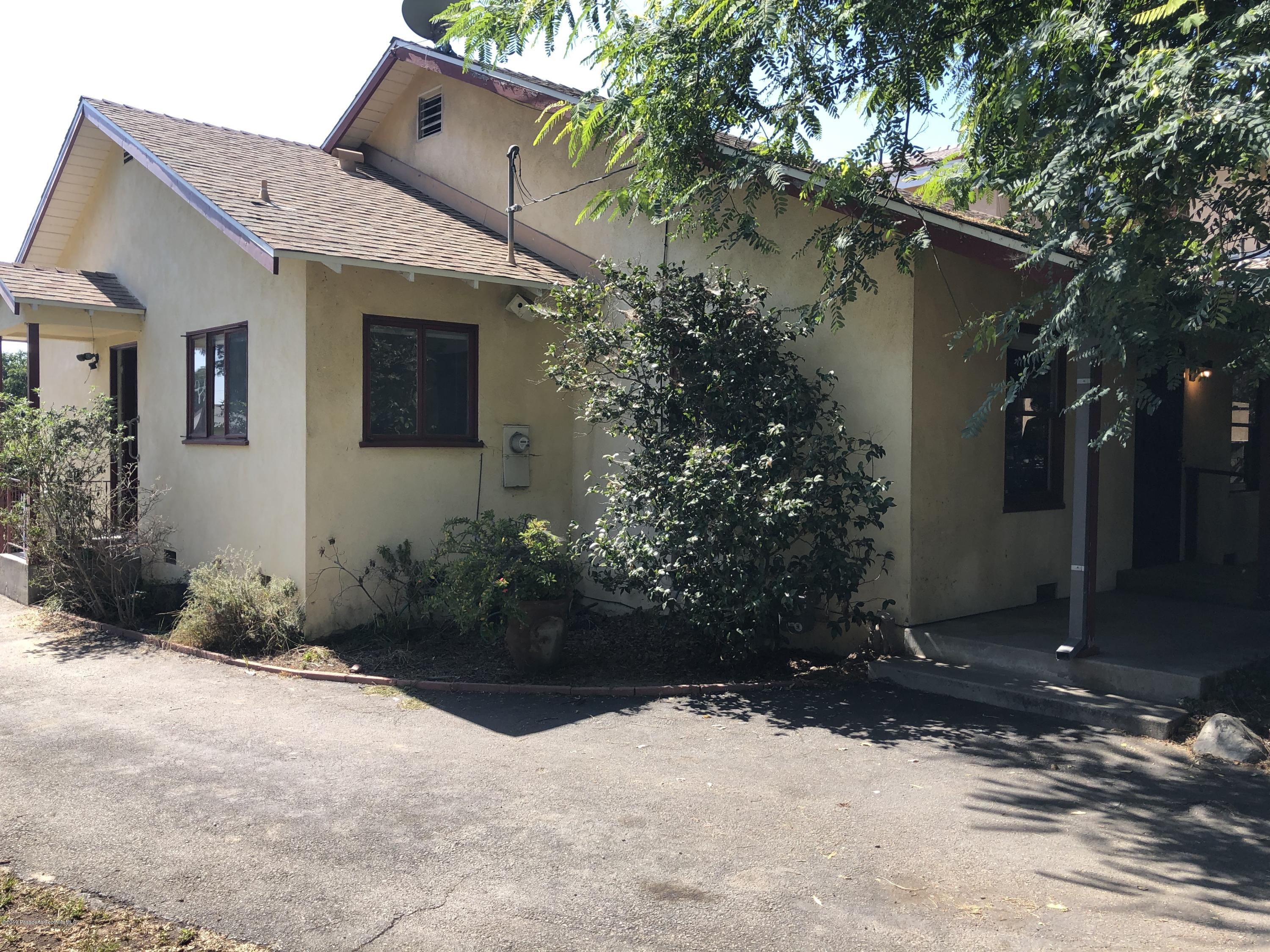 8744 Duarte Road San Gabriel, CA 91775 - Photo 11 of 16 a front view of a house with garden
