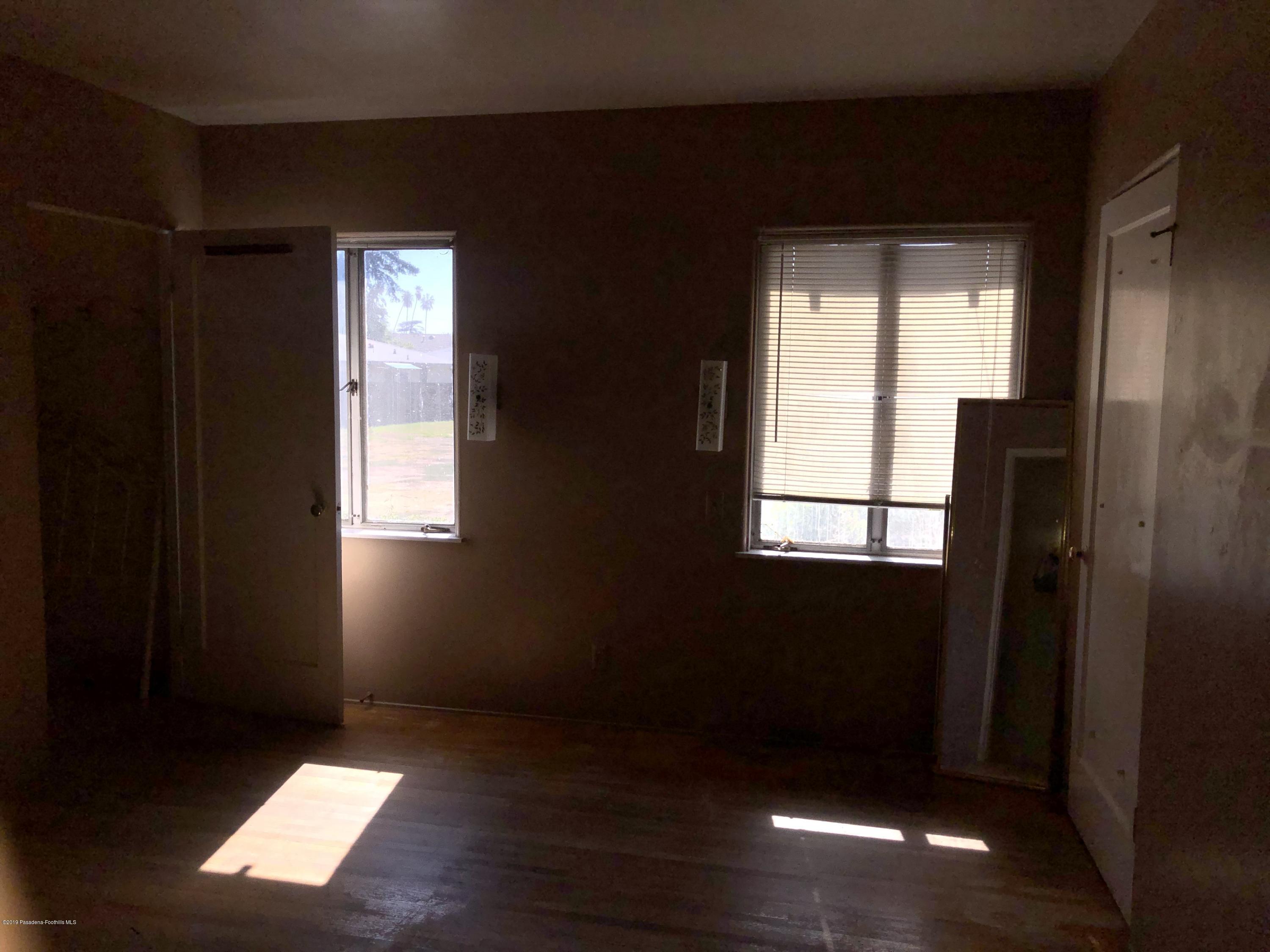 8744 Duarte Road San Gabriel, CA 91775 - Photo 14 of 16 a view of empty room with windows