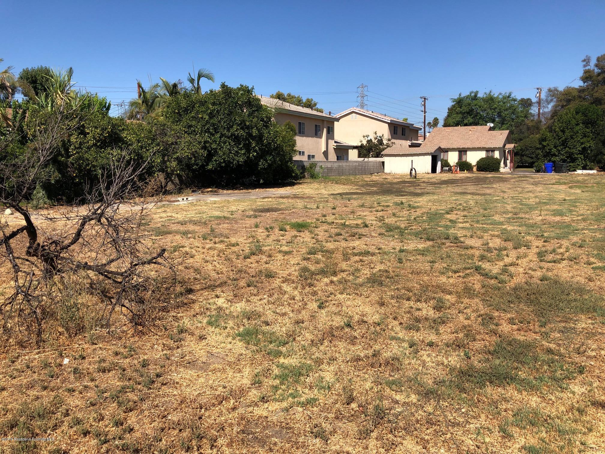 8744 Duarte Road San Gabriel, CA 91775 - Photo 16 of 16 a view of a house with a yard