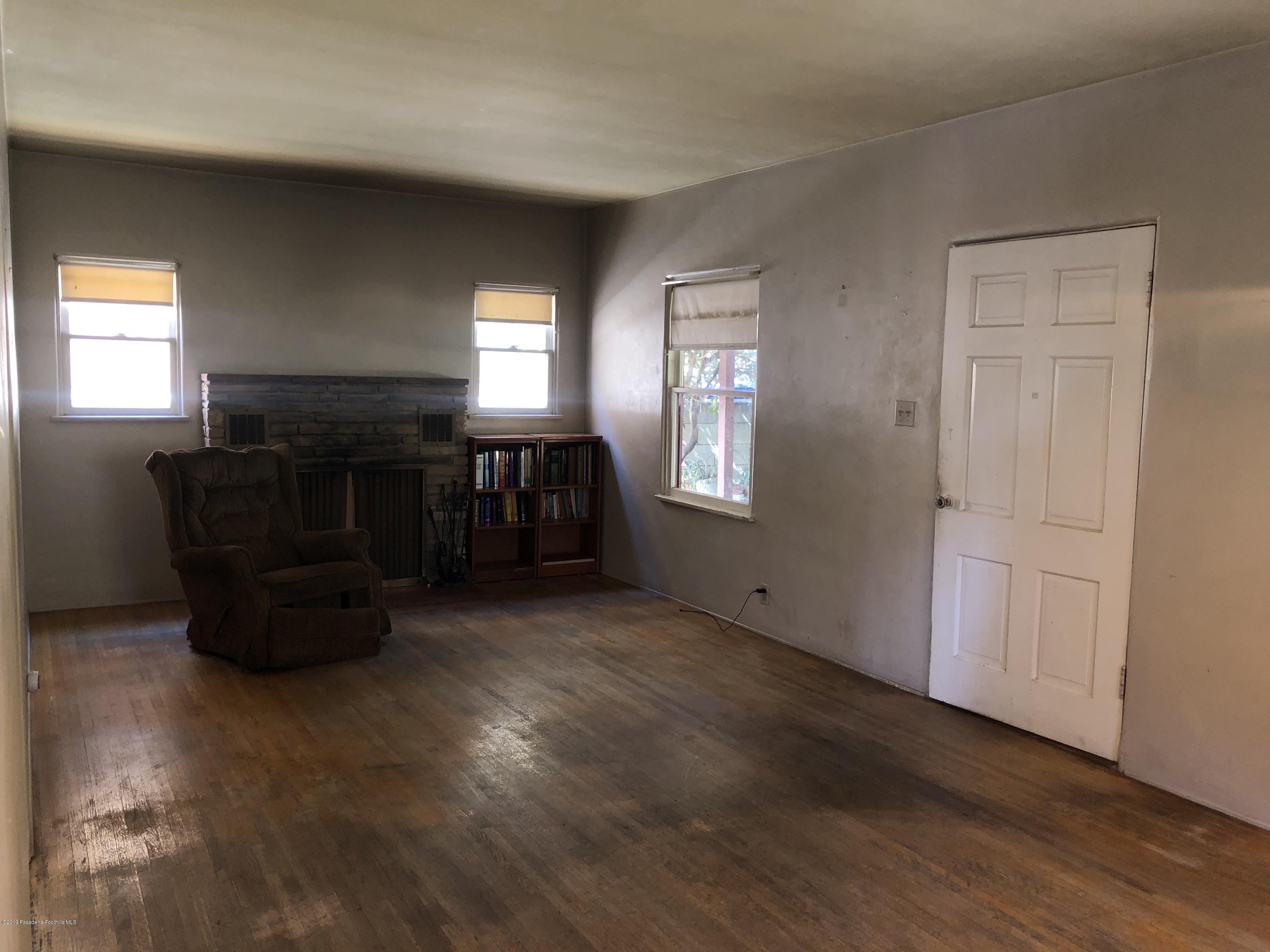8744 Duarte Road San Gabriel, CA 91775 - Photo 7 of 16 a view of a livingroom with furniture and windows