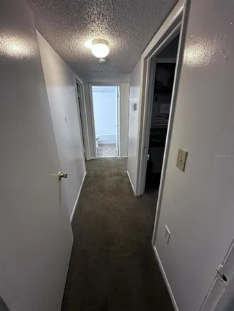 a view of hallway with stairs