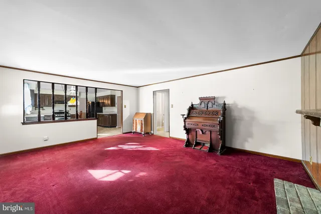 a view of a livingroom with furniture