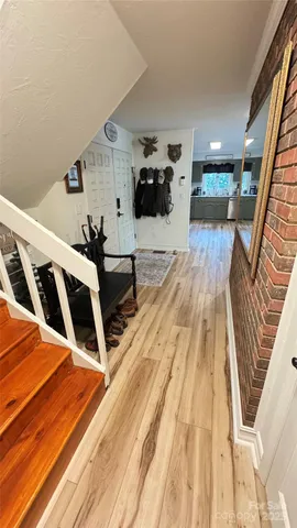 a view of a from a dining room with furniture window and outside view