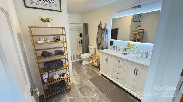 a view of a wooden deck next to a yard