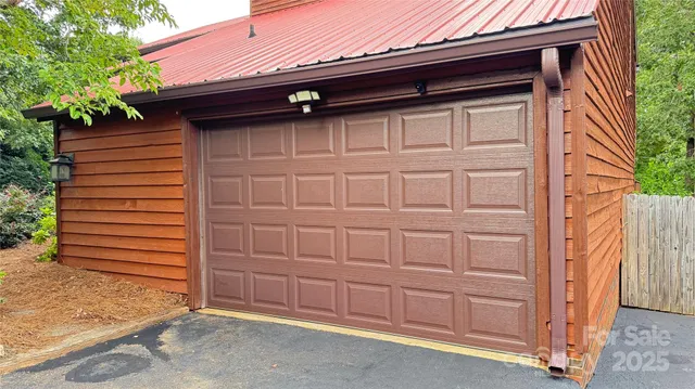 a bathroom with a sink mirror vanity and toilet