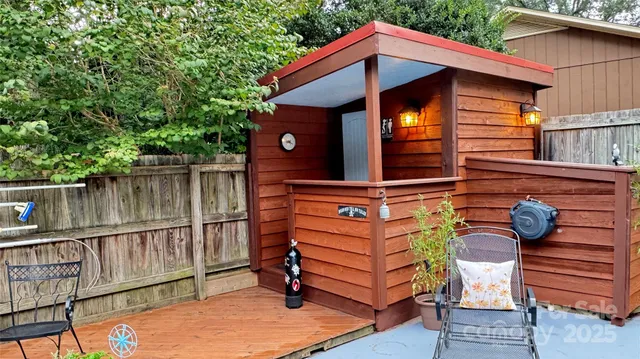 a view of a swimming pool with a yard