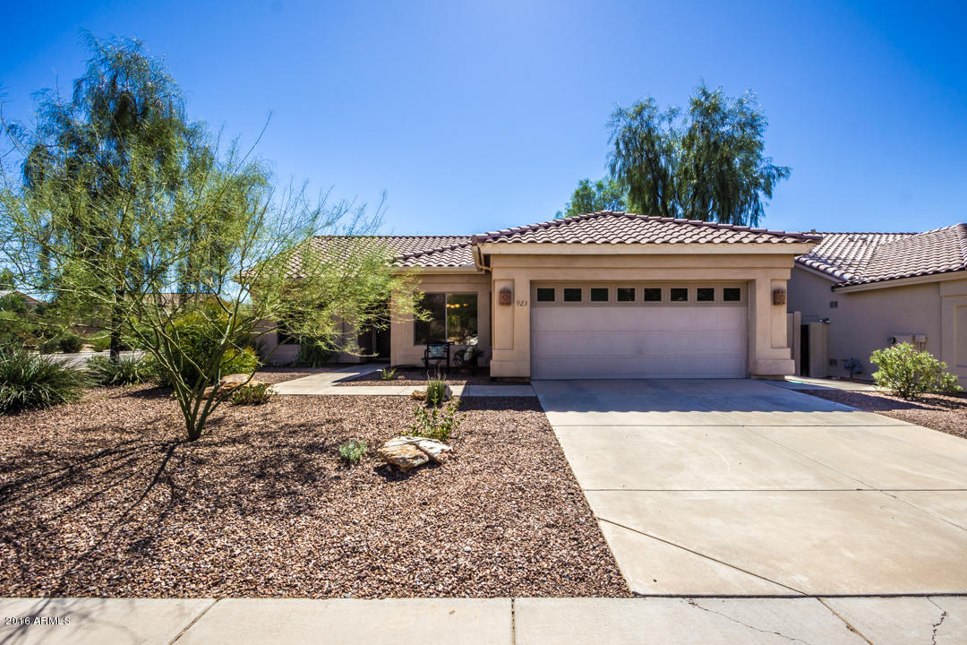 923 East Redfield Road Phoenix, AZ 85022 - Photo 1 of 42 a front view of a building with a garden